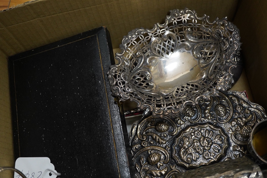 A group of small silver and white metal items including a late Victorian silver cream jug, a late Victorian silver mounted hand mirror, two continental 900 standard mounted small wall mirrors, a modern miniature silver t